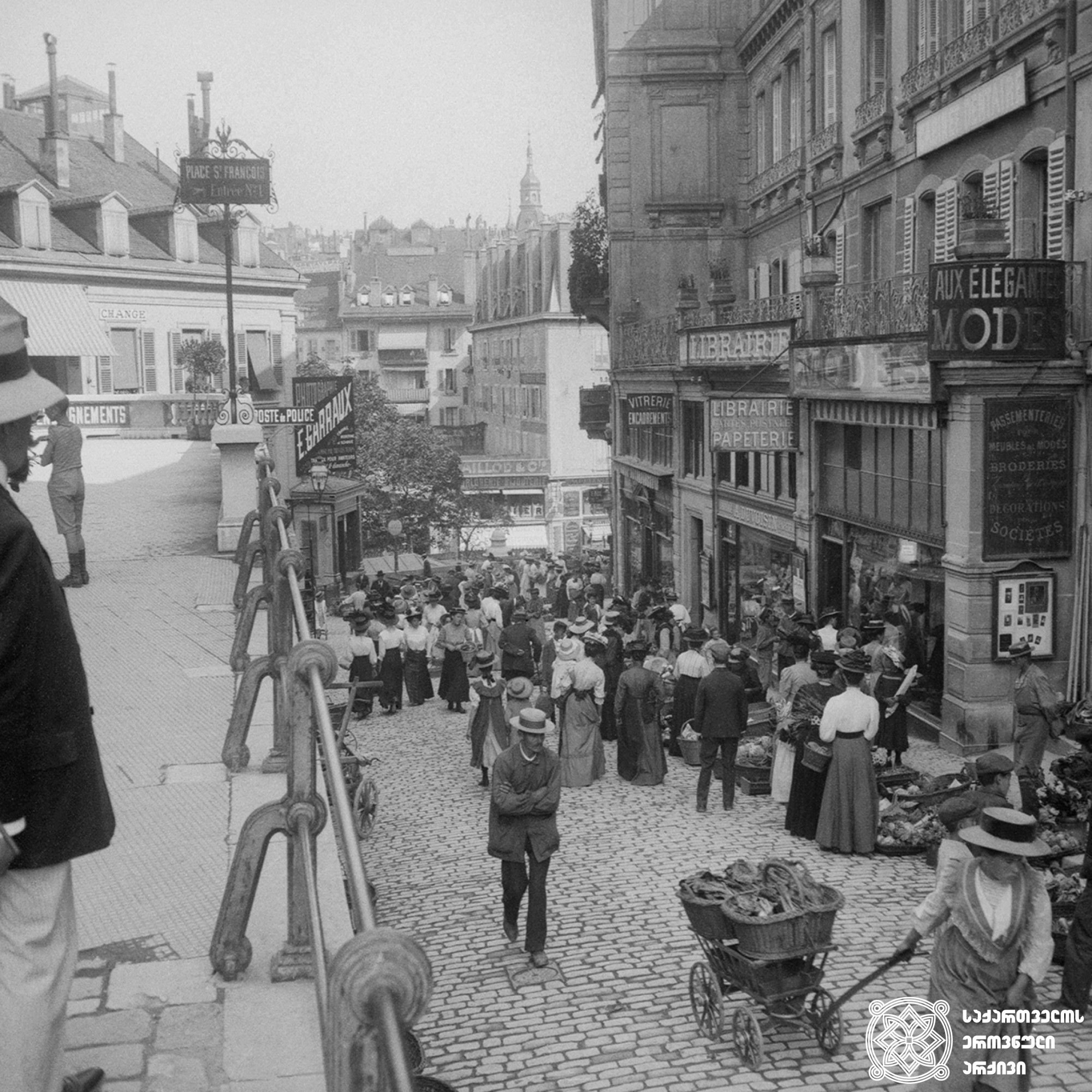 ბაზრობა ლოზანას ქუჩაში, შვეიცარია <br>
1909 წელი <br>
გიგლო ყარალაშვილის კოლექცია <br>

Market on Lausanne Street, Switzerland <br>
1909  <br>
Giglo Karalashvili collection